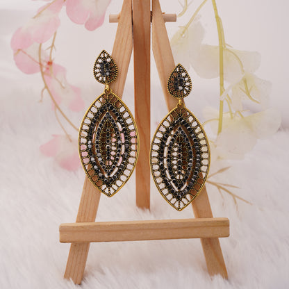 Intricate Leaf Drop Earrings with Stone Accents